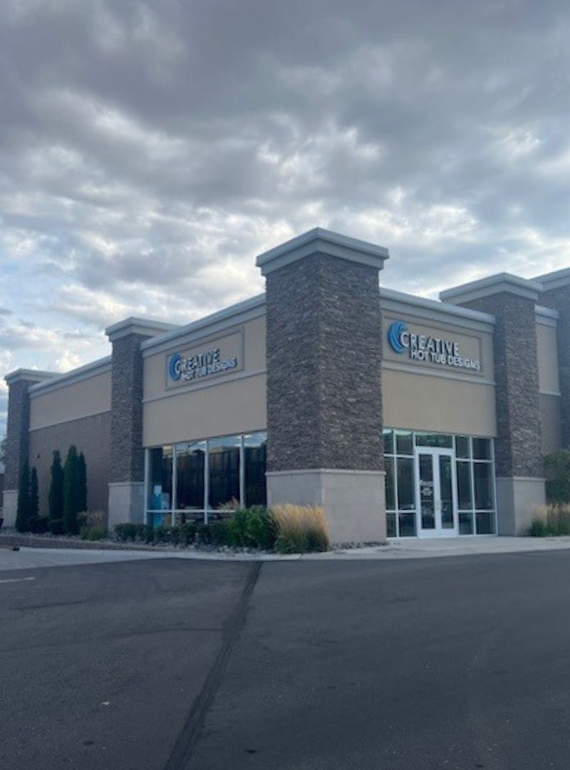 Creative Hot Tub Designs storefront in Sparks, NV, featuring modern architecture and signage, promoting quality hot tubs and swim spas.