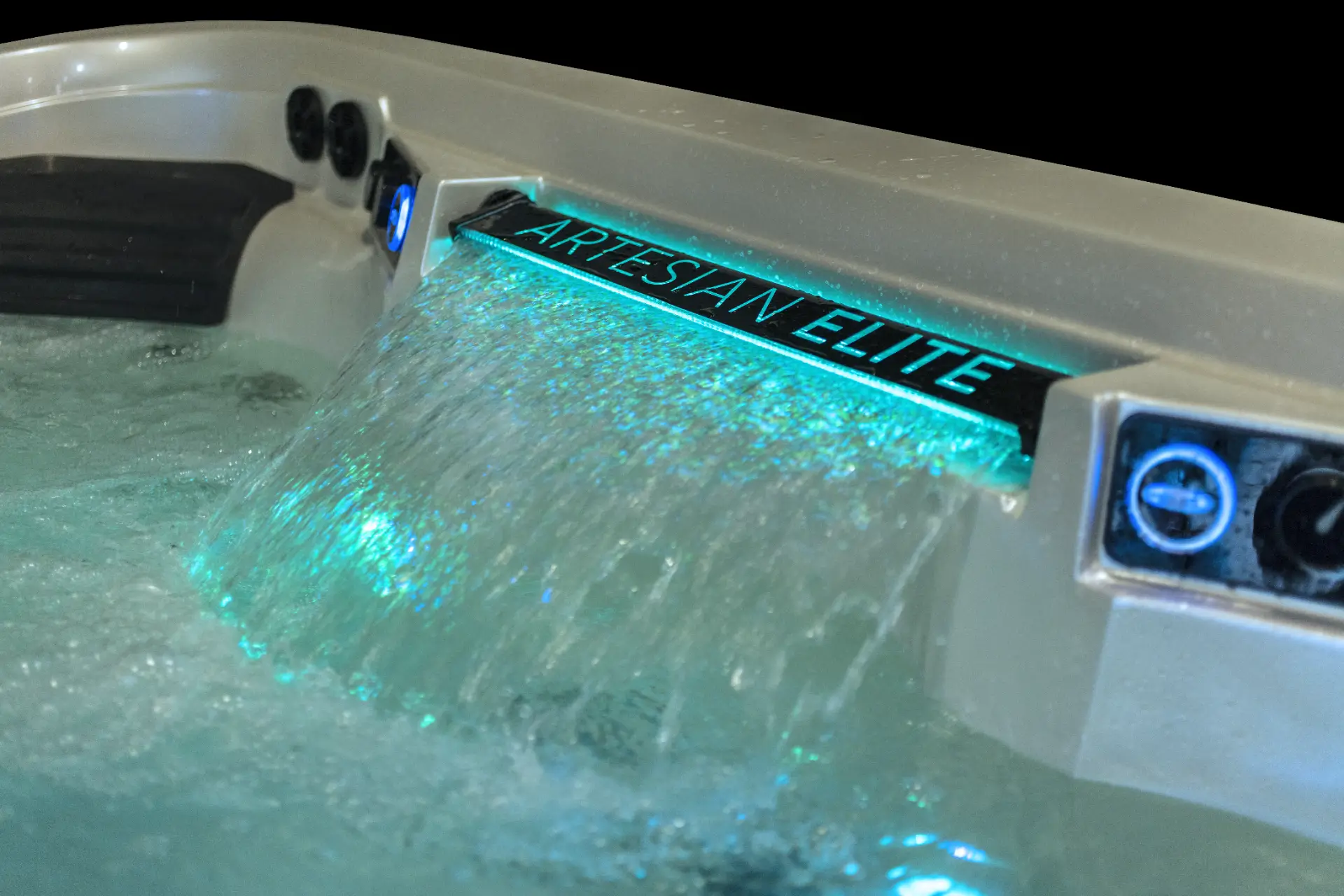 Artesian Elite hot tub showcasing illuminated water feature and advanced controls, designed for luxury hydrotherapy and relaxation in Reno NV and Sparks NV by Creative Hot Tub Designs.