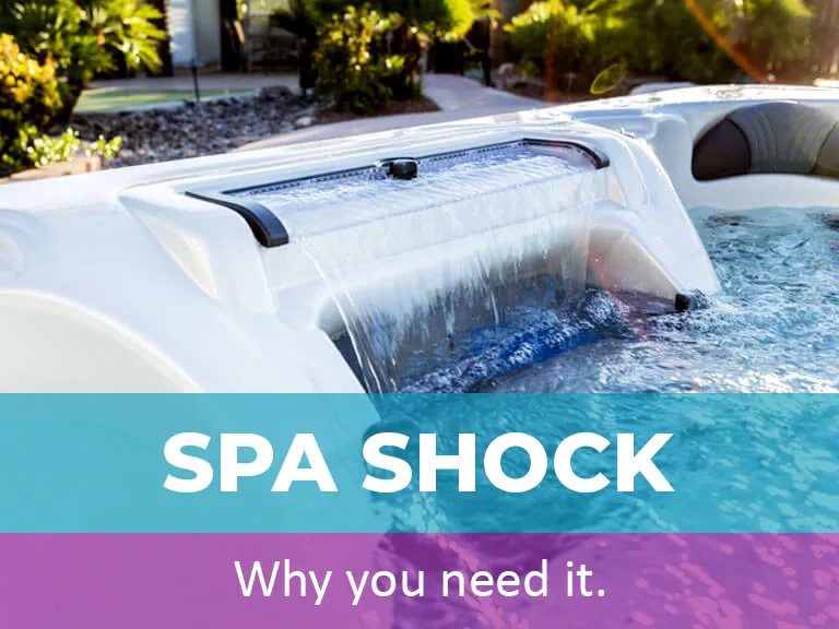 Hot tub with spa shock feature and water cascading, emphasizing maintenance importance for optimal hot tub care.